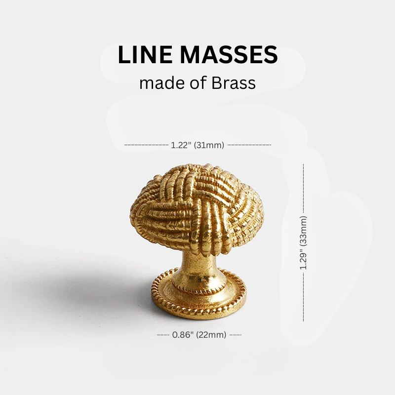 Gold decorative knob with measurements on a white background