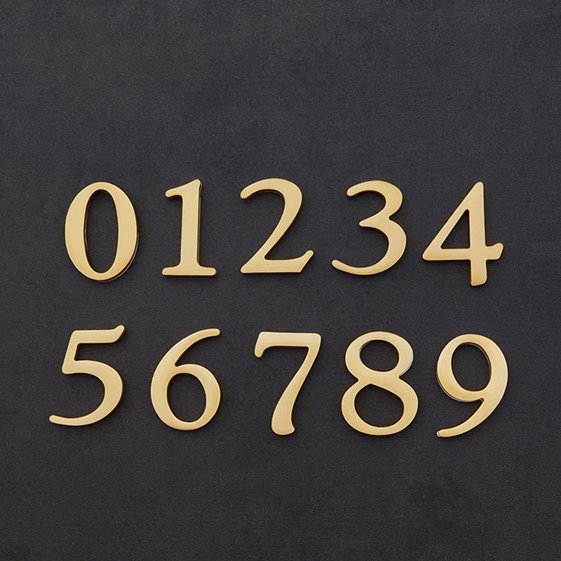 Set of gold metallic numbers on a black background