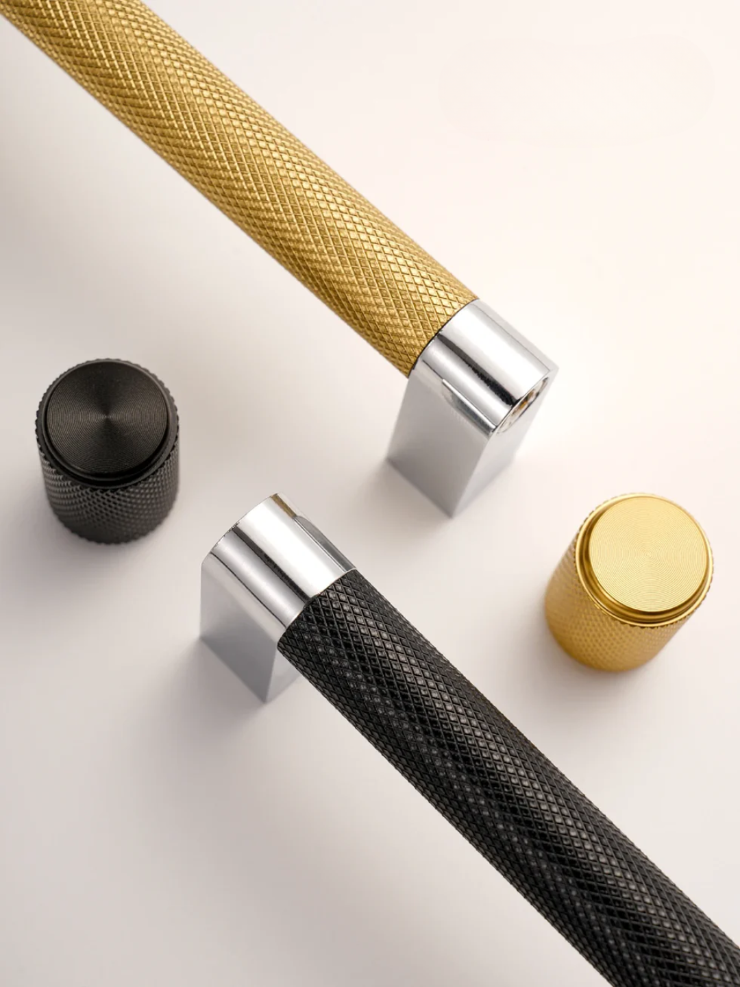 Luxury hardware knobs and handles with Santaya branding on a light background