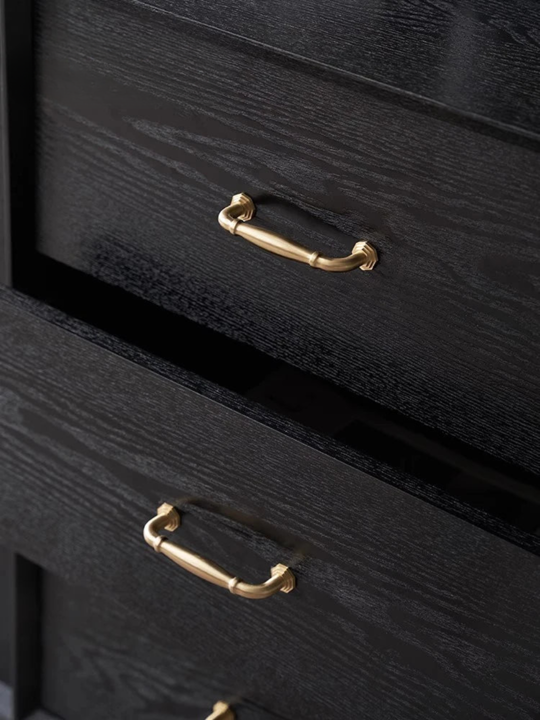Black wooden drawer with gold handles