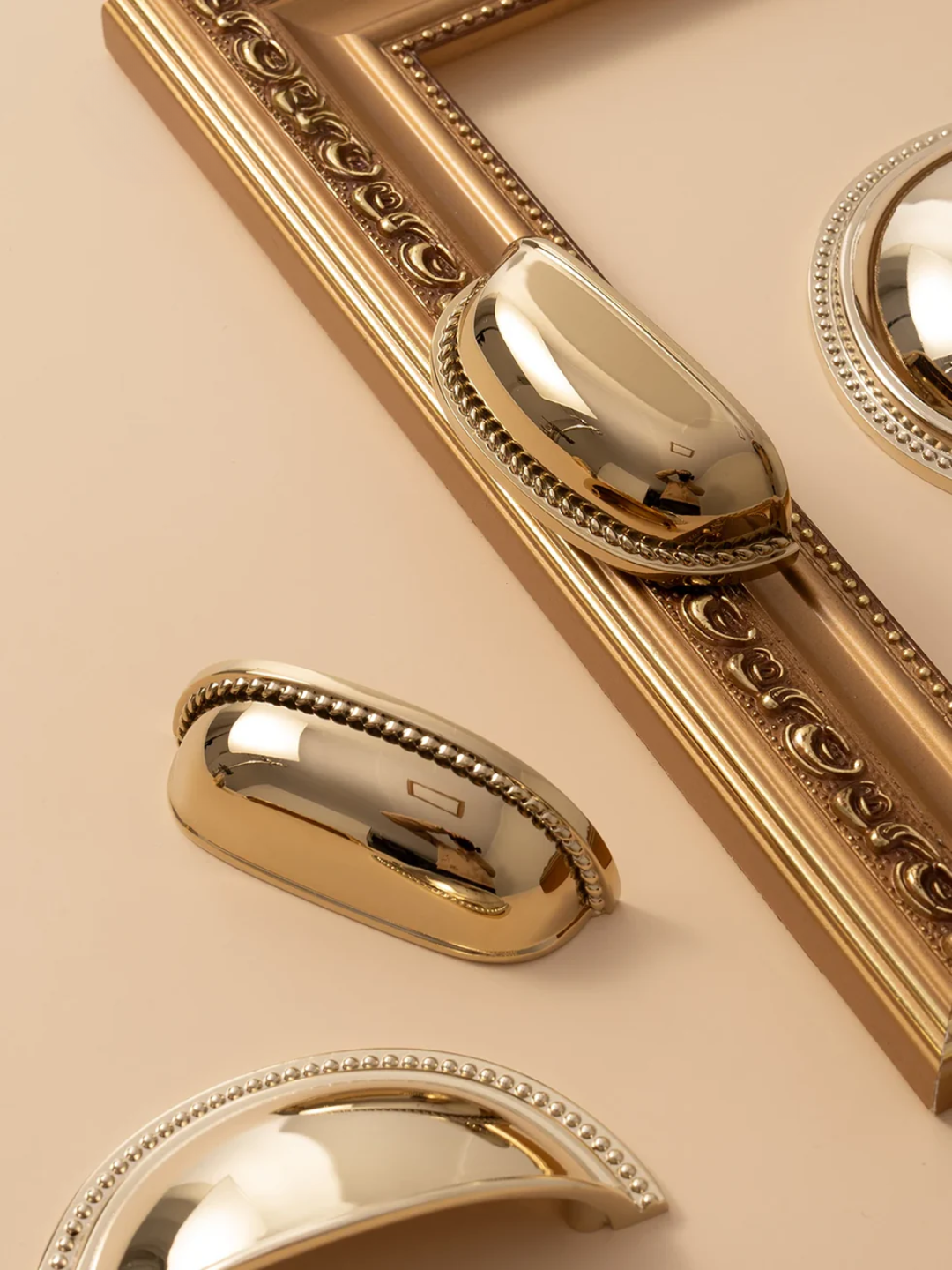 Decorative gold door handle and lock on a beige door with 'Santaya' branding.