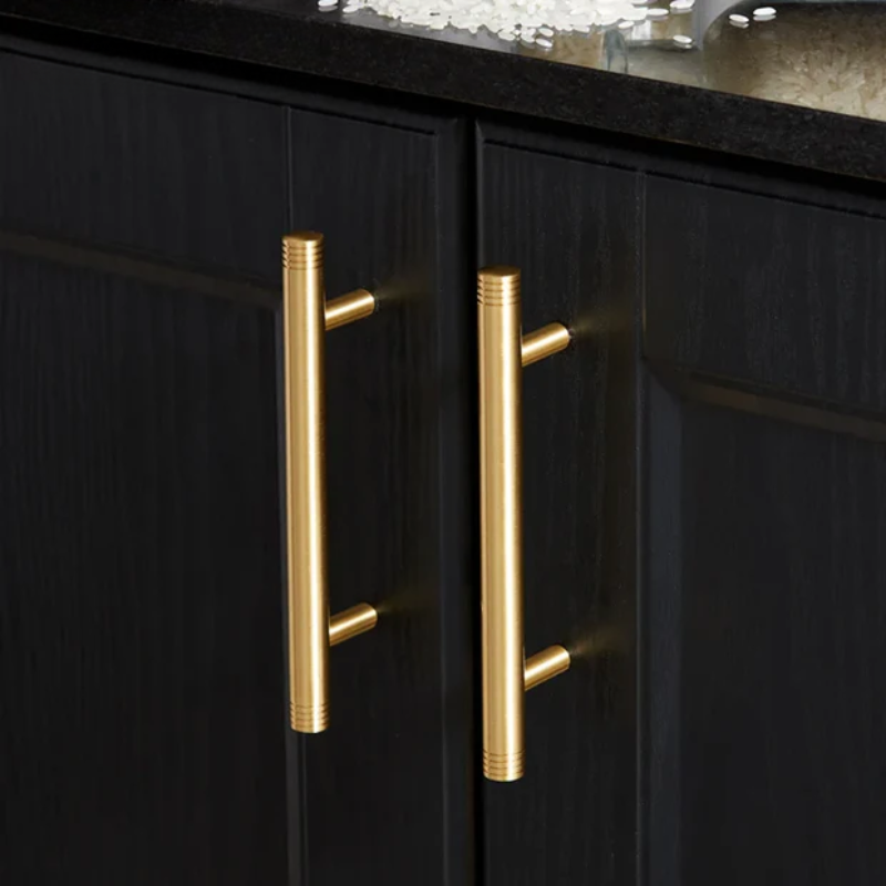 Black cabinet with gold handles