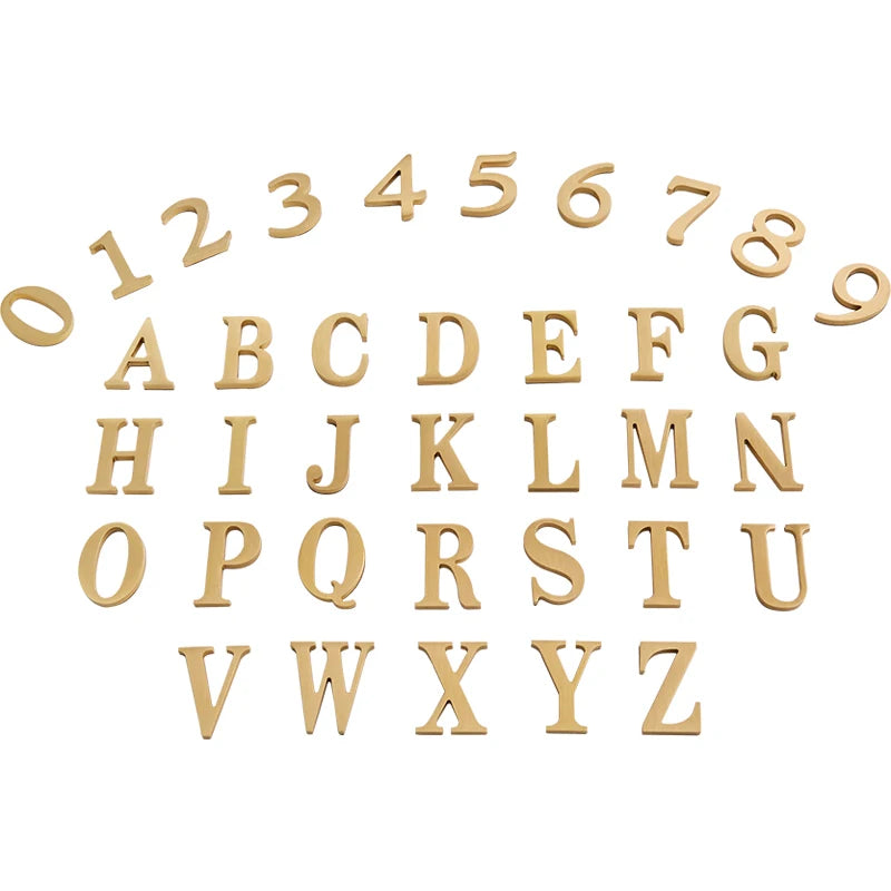 Set of gold letters and numbers on a white background