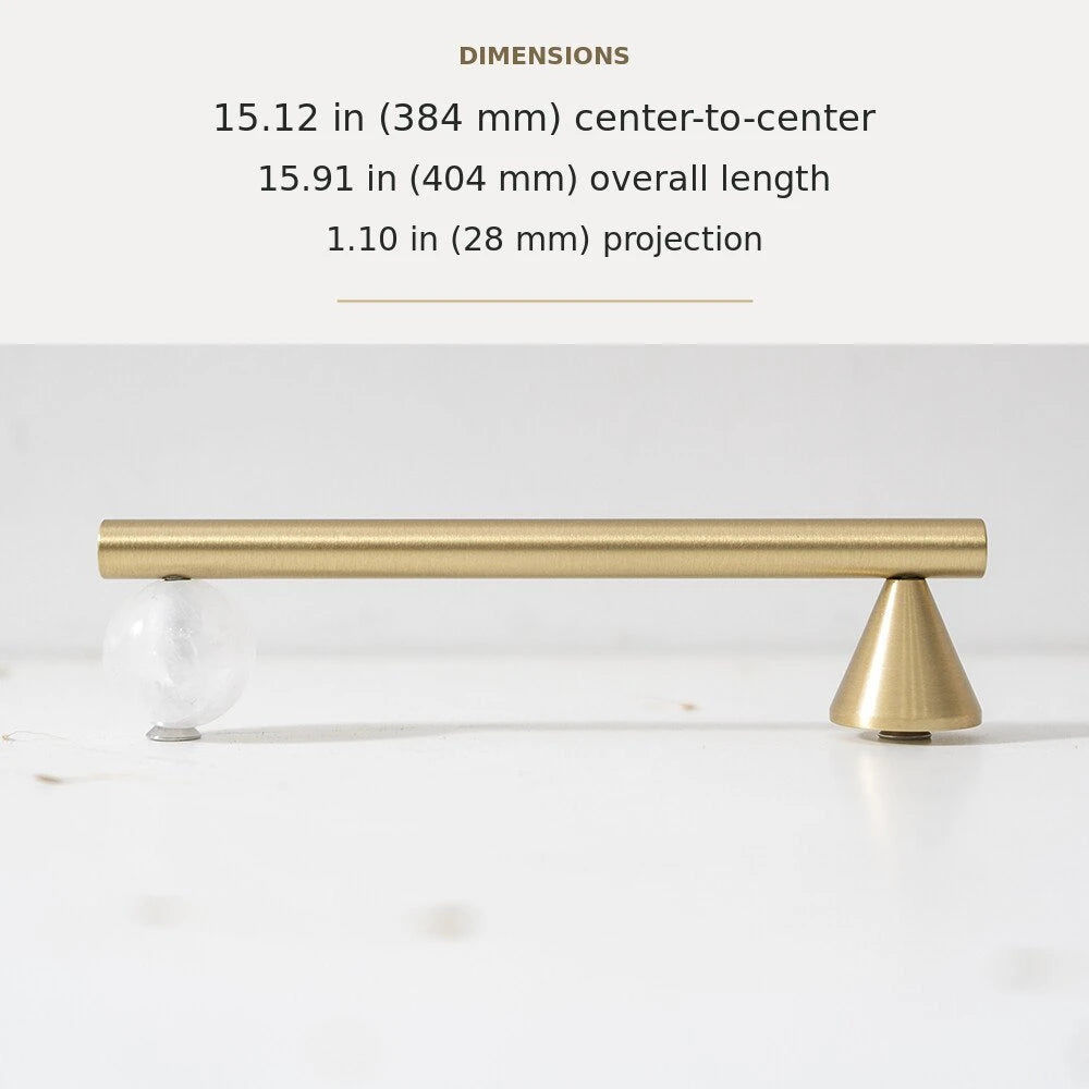 White decorative accent and brass cabinet pull, 15.12-inch center-to-center