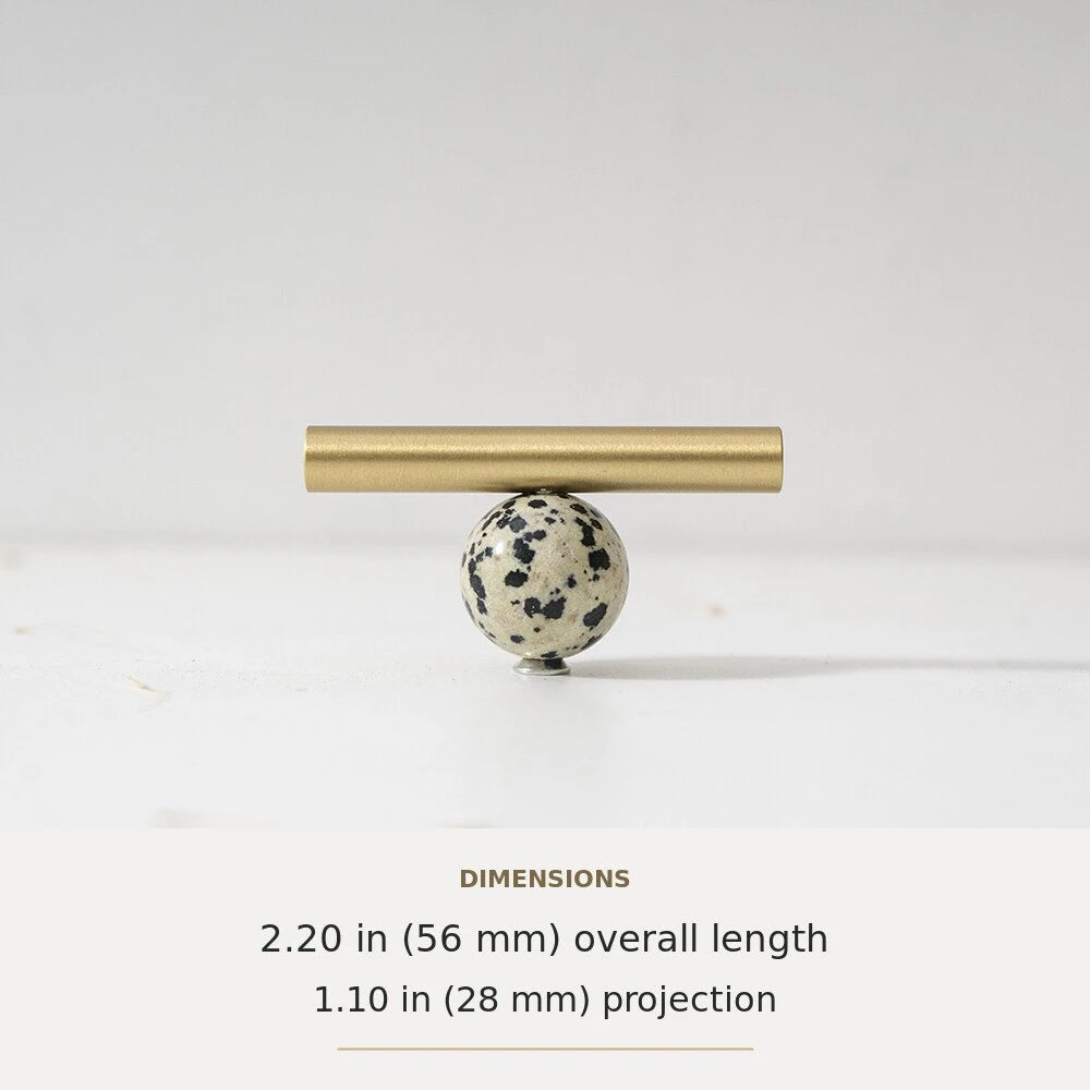 White Marble decorative accent and brass T-bar cabinet knob