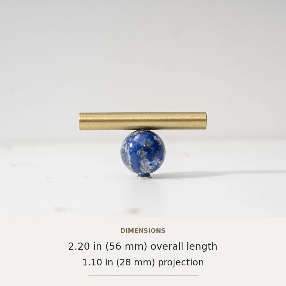 Blue decorative accent and brass T-bar cabinet knob
