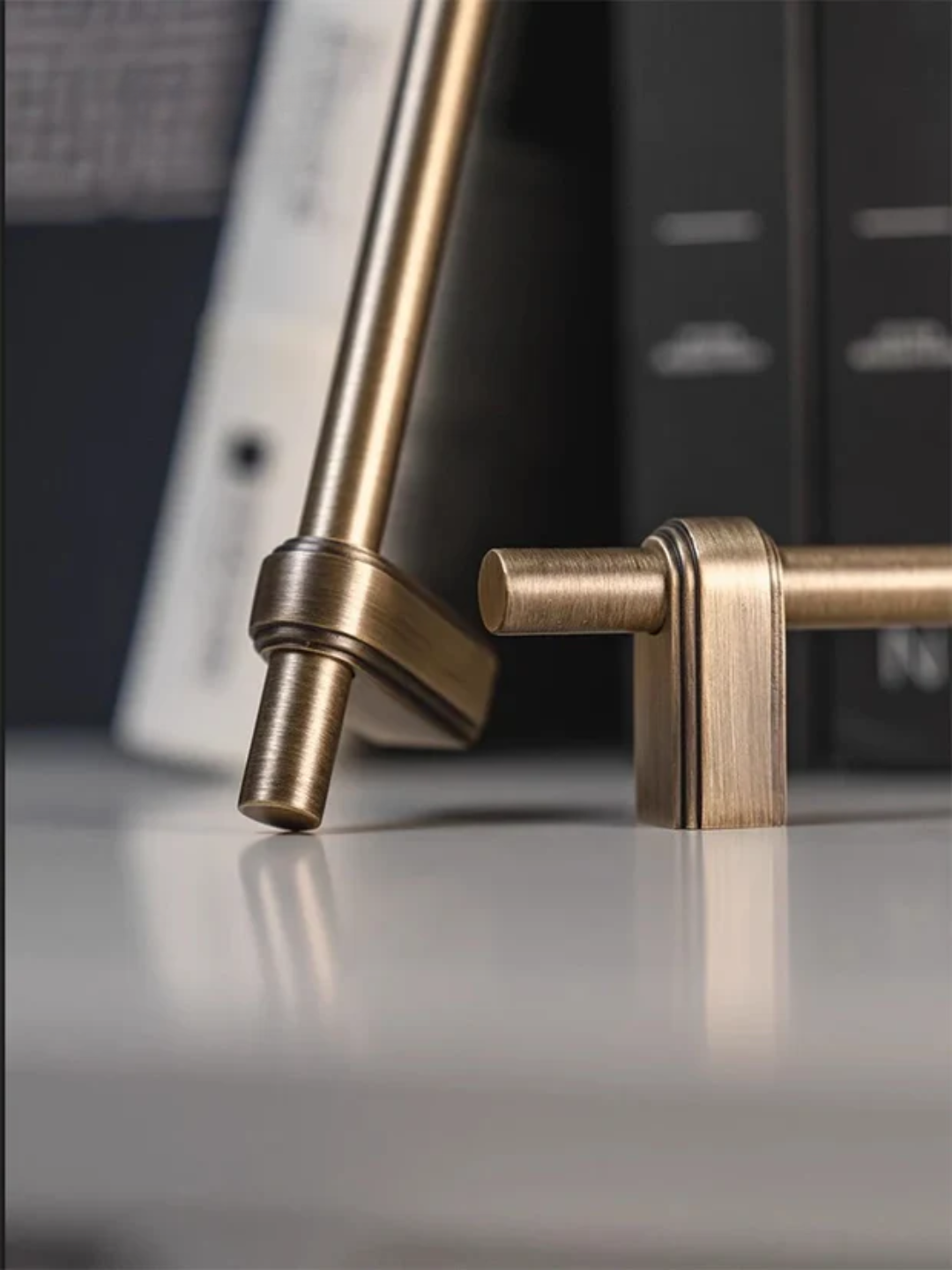 Brass door handle on a metallic surface with 'Santaya' branding.