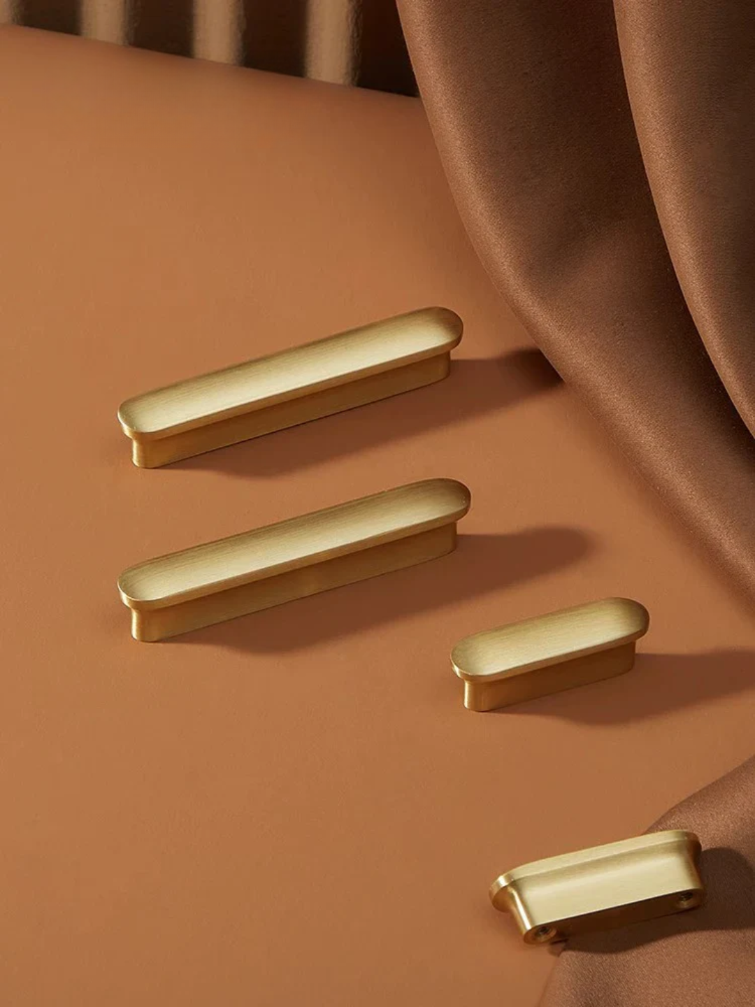 Gold bars on a brown surface