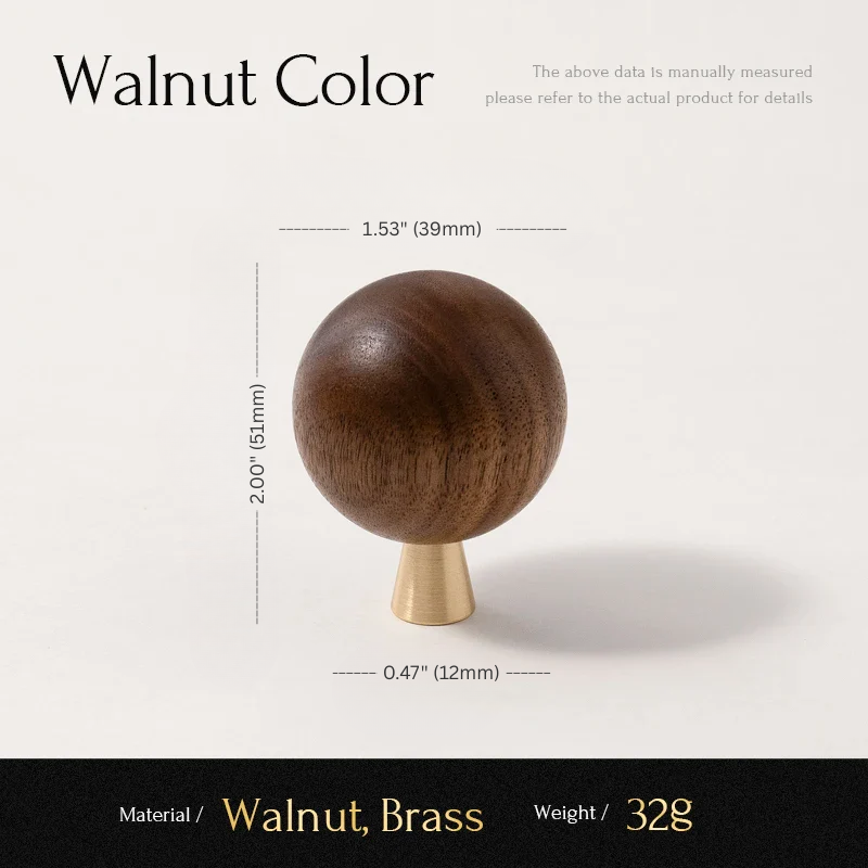Wooden ball with brass base and measurements on a white background