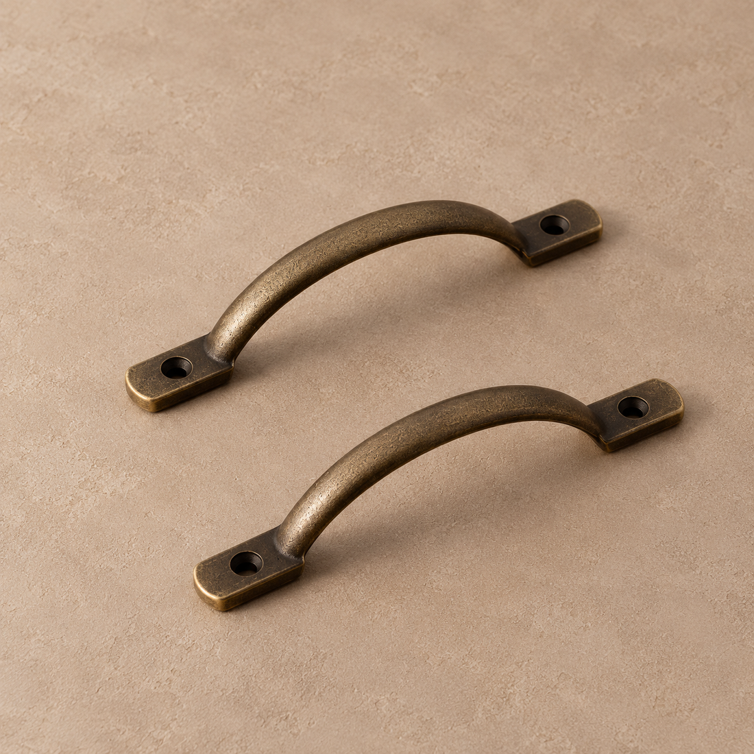 No-Drill Solid Brass Cabinet Pull — Antique Brass on a warm ivory background