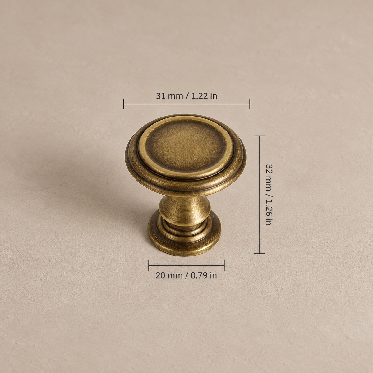 Antique brass 31 mm cabinet knob with inch and millimeter dimensions