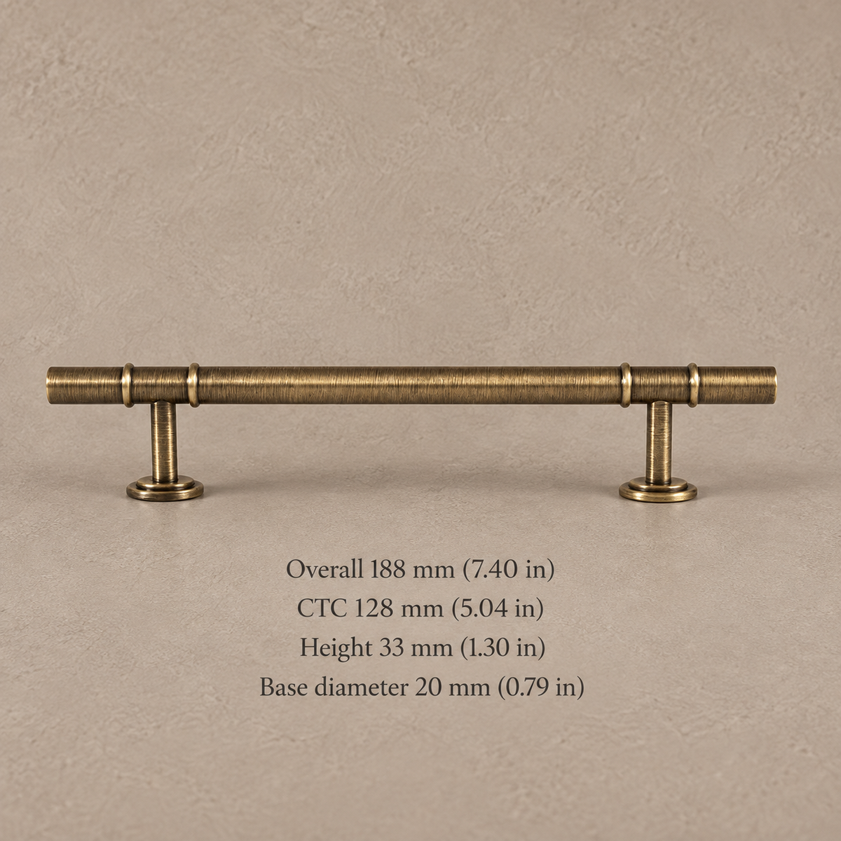 Antique brass cabinet hardware 128mm on taupe plaster with dimensions