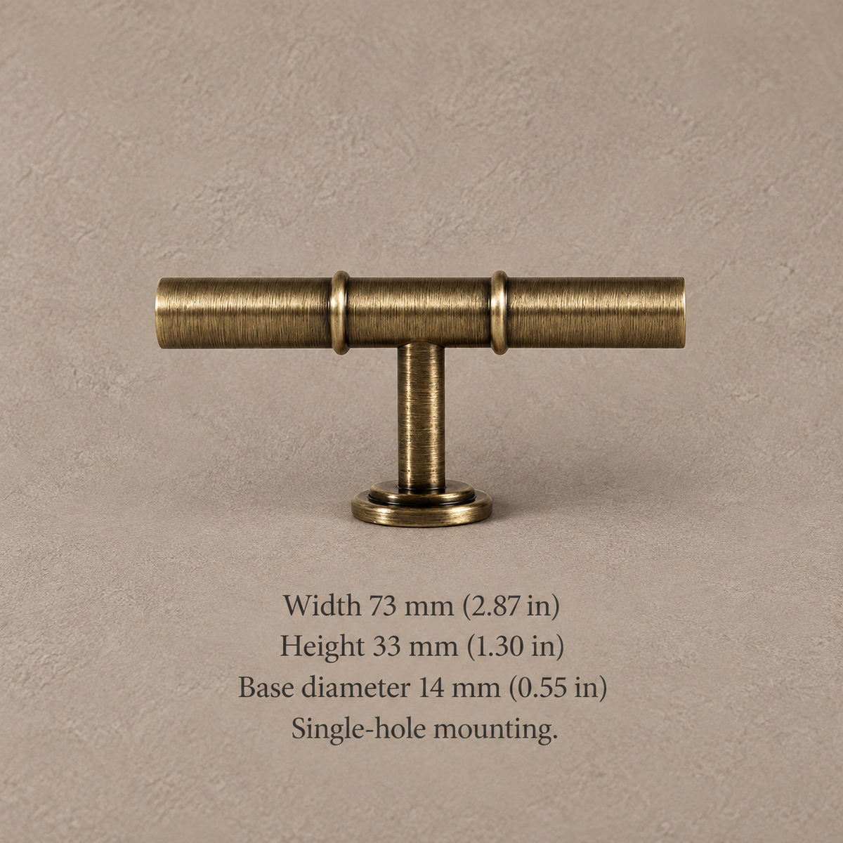 Antique brass cabinet hardware 73mm t bar on taupe plaster with dimensions