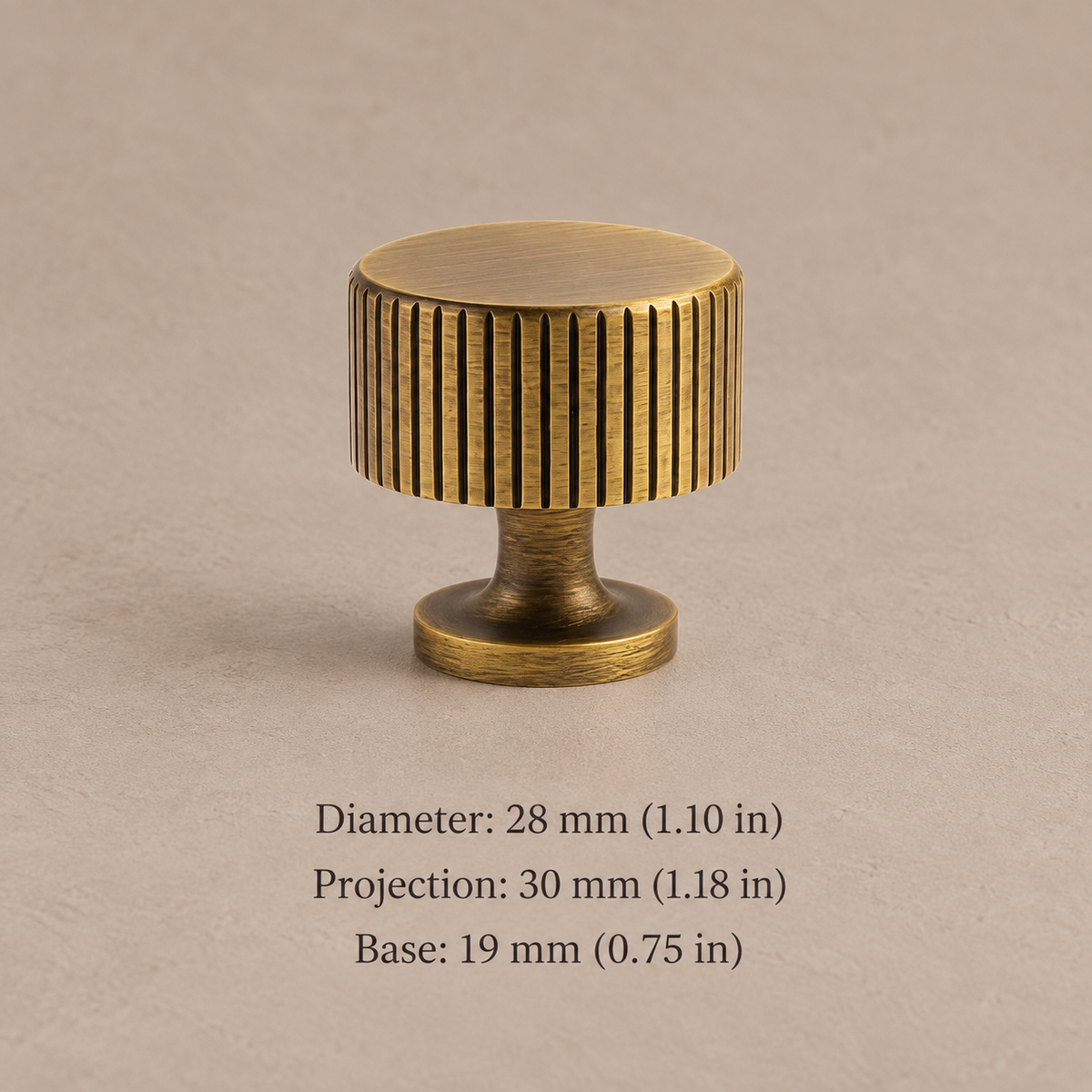 Antique brass fluted drum cabinet knob 28 mm diameter with millimeter and inch measurements