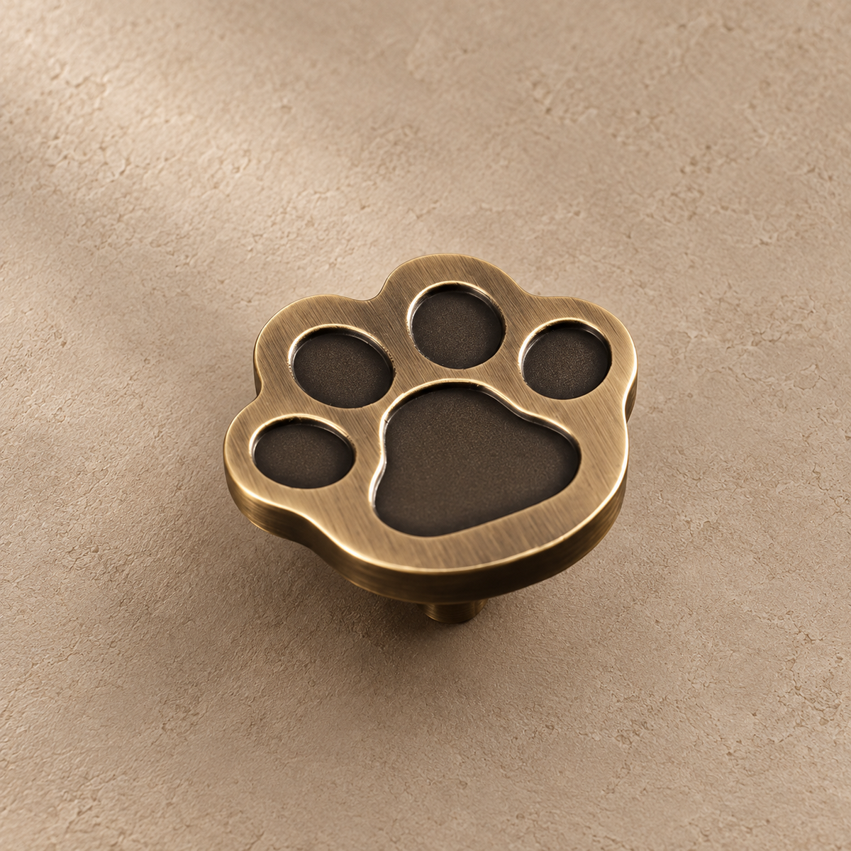 Antique brass paw cabinet knob close-up