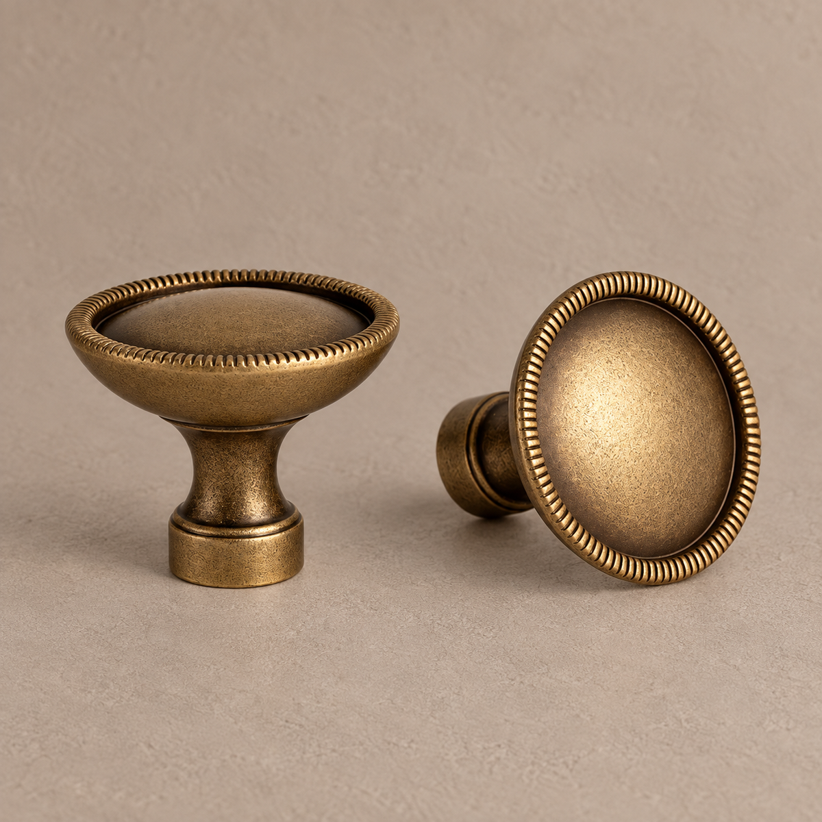 Antique brass ribbed rim knob front and side views