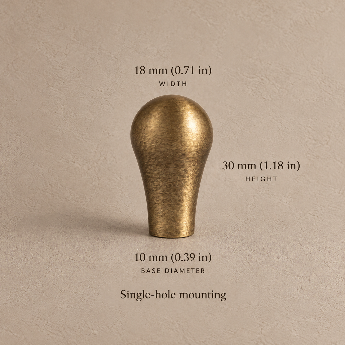 Antique brass slim bar 18mm knob on taupe plaster, dimensions in mm and inches