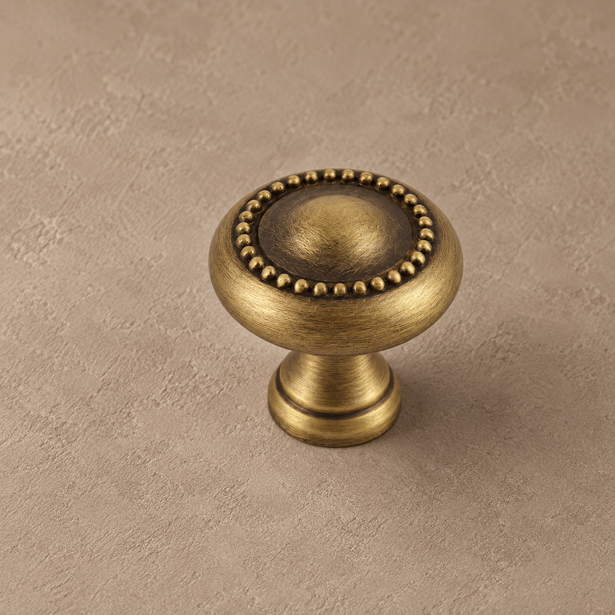 Antique brass beaded round cabinet knob detail