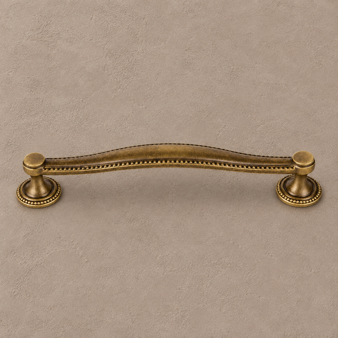 Antique Bronze Solid Brass Cabinet Knob & Cup Handle on a deep olive studio background