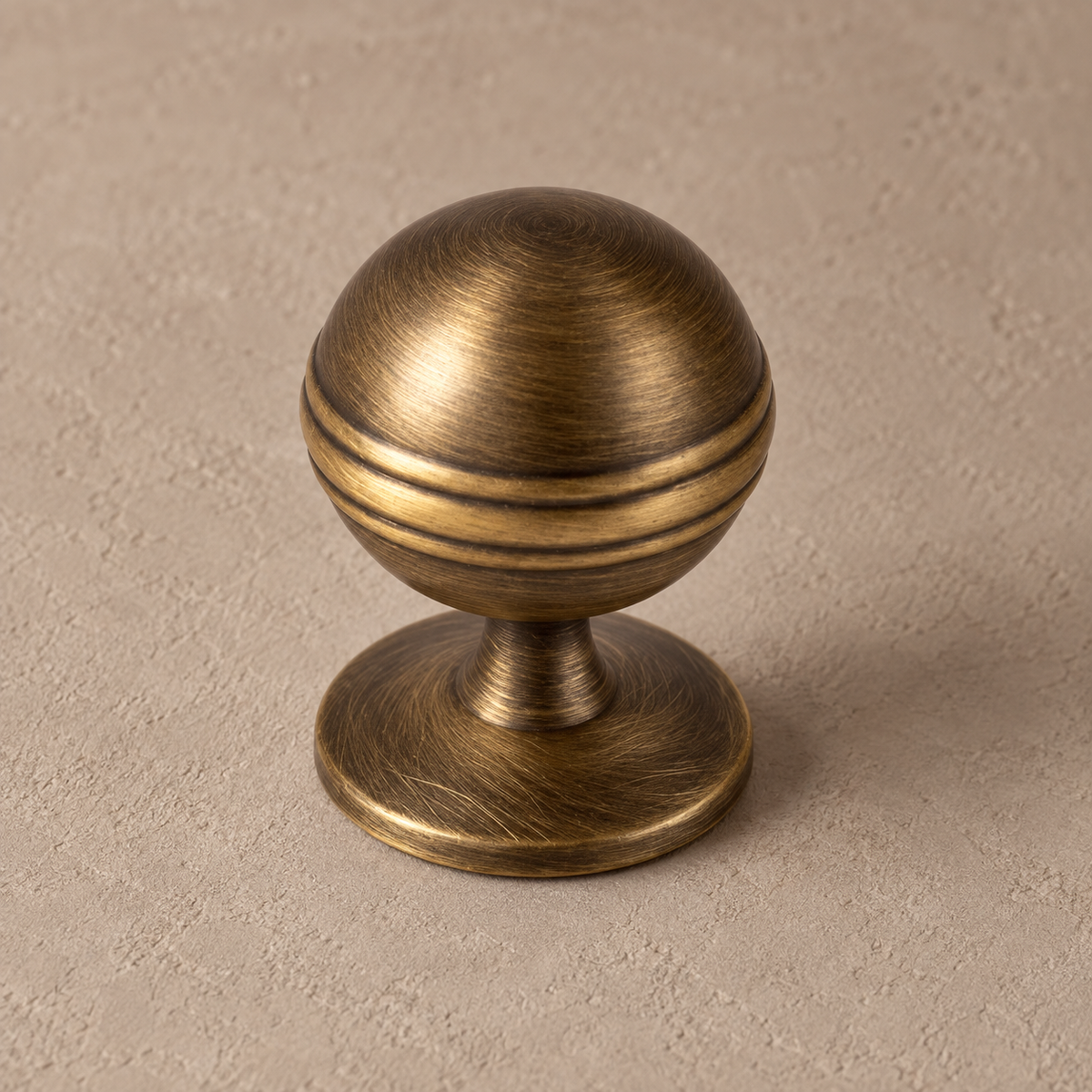 Antique brass ringed ball knob closeup