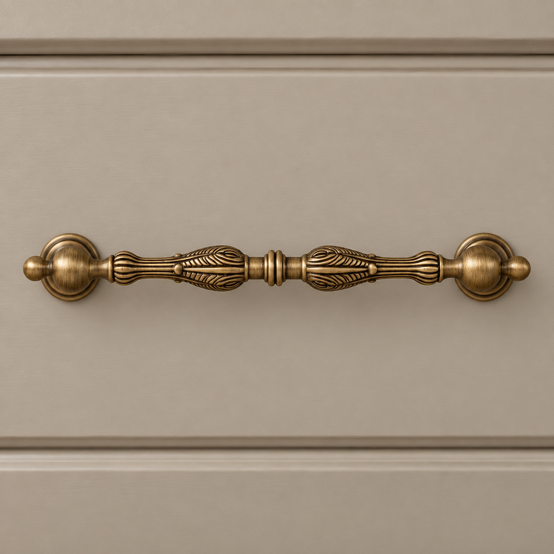 Ball-End Spindle Cabinet Pull & Knob — Antique Brass on warm ivory stone