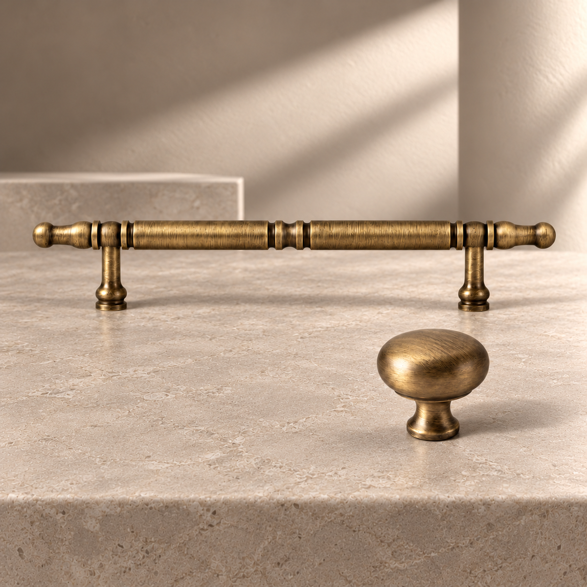 Antique Brass Cabinet Pulls & Knobs — Retro Modern Design on a neutral stone studio background
