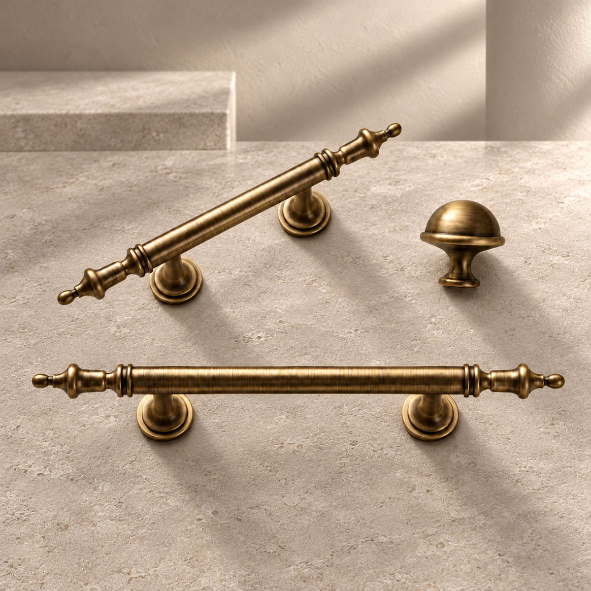 Solid Brass Crown-Style Cabinet Pulls & Knob — Antique Brass on a neutral stone studio background