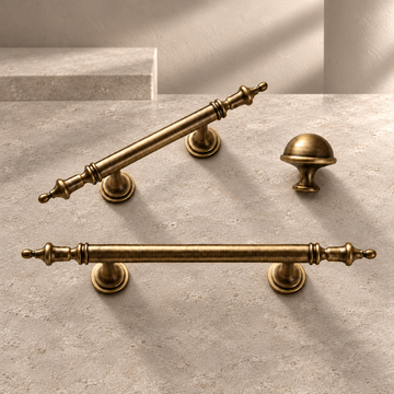 Solid Brass Crown-Style Cabinet Pulls & Knob — Antique Brass on a neutral stone studio background
