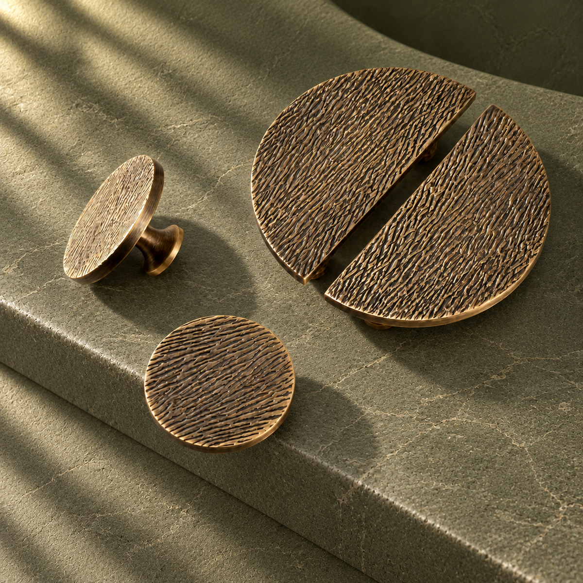 Antique Brass Round Cabinet Knob & Pull — Solid Brass Hardware on a deep olive studio background