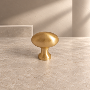 Brushed & Antique Brass Cabinet Pull & Knob — Solid Brass on a neutral stone studio background