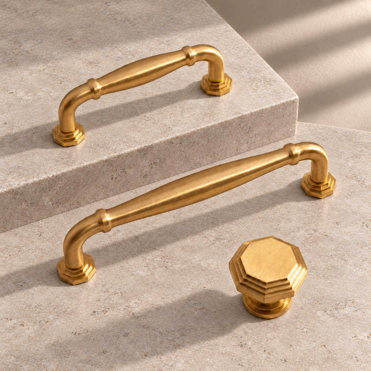 Brushed Brass Cabinet Pulls & Knob — Modern Design on a neutral stone studio background