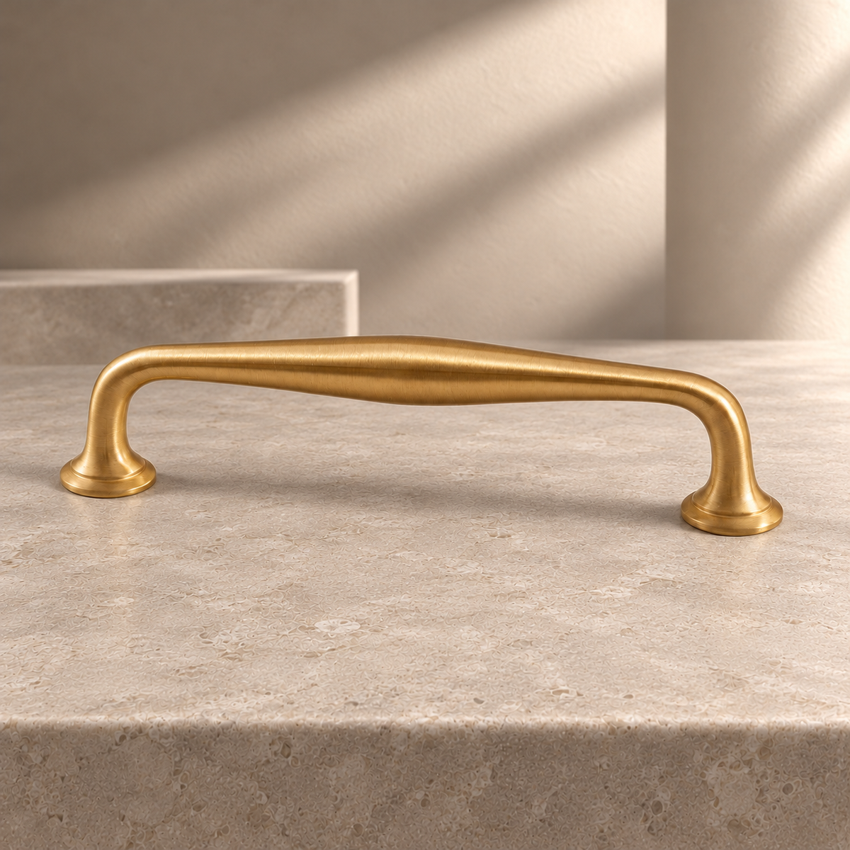 Brushed Brass Cabinet Pulls & Knobs — Nordic Minimalist Design on a neutral stone studio background