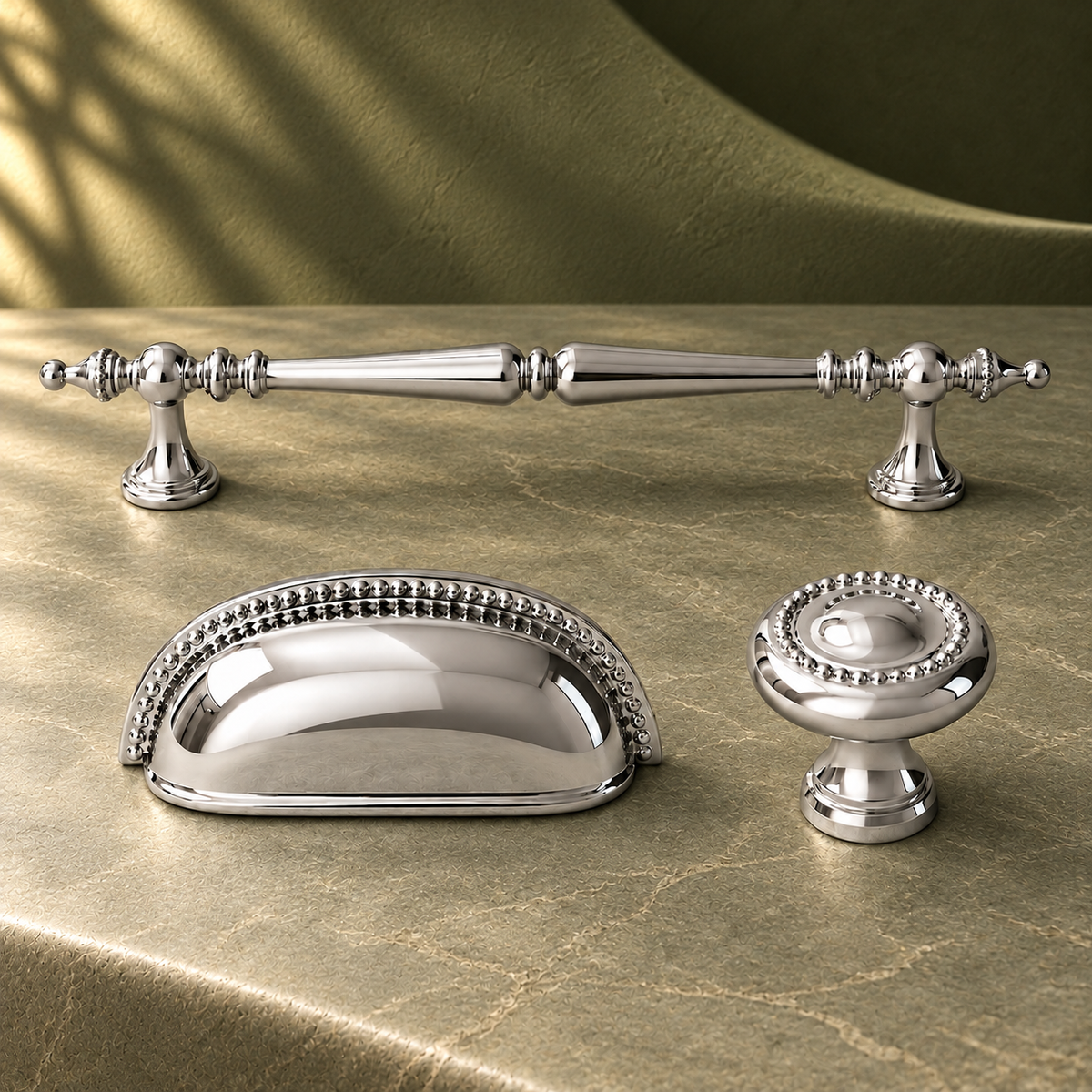 Chrome Brass Cabinet Pull & Knob — Solid Brass European Hardware on a deep olive studio background