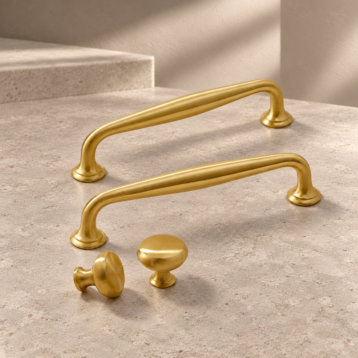 Polished Brass Cabinet Pull & Knob — Solid Brass on a neutral stone studio background