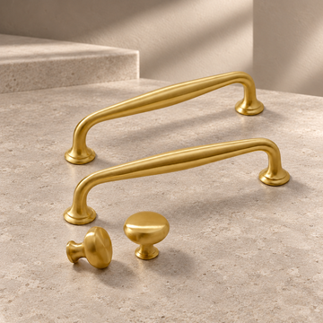 Polished Brass Cabinet Pull & Knob — Solid Brass on a neutral stone studio background