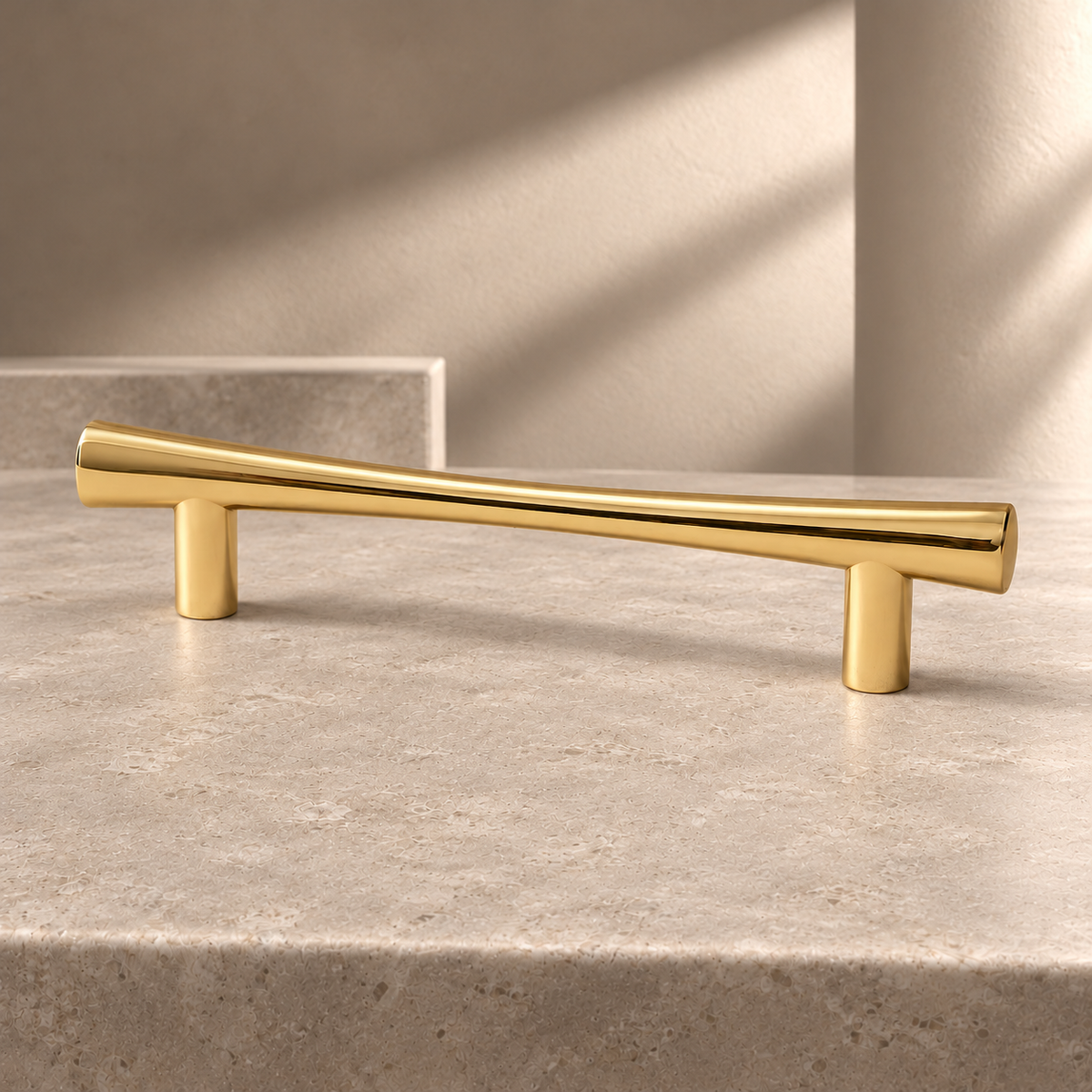 Polished Brass Cabinet Pulls & Knobs — Modern Design on a neutral stone studio background
