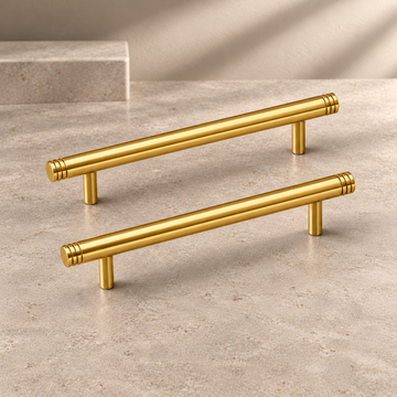 Polished Brass Straight Rod Cabinet Pull & Knob — Solid Brass on a neutral stone studio background