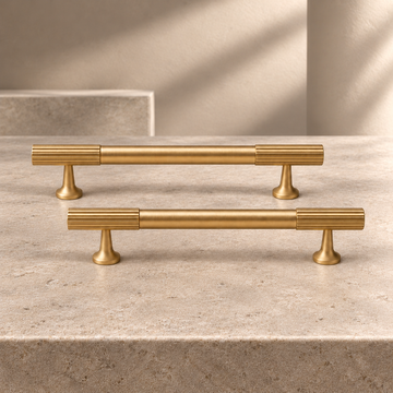 PVD Brass Linear Cabinet Pull & Knob — Solid Brass on a neutral stone studio background