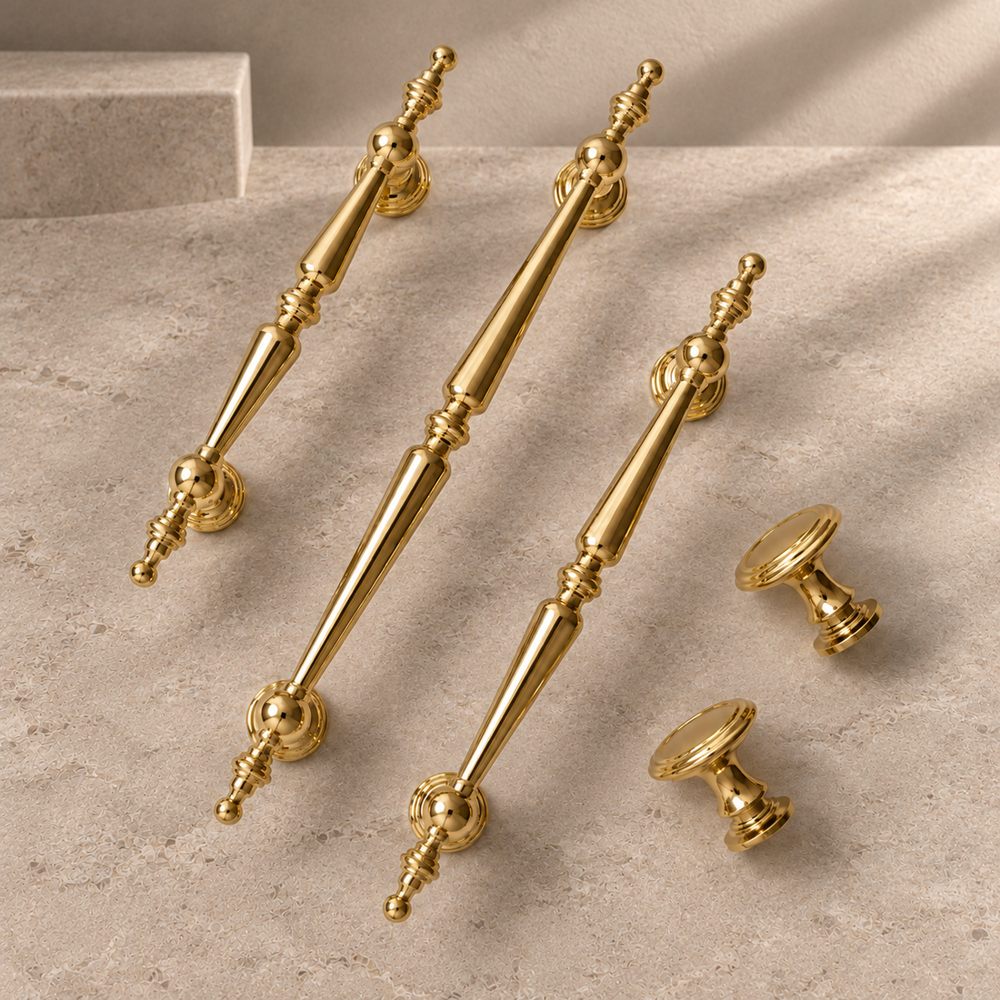 PVD Bright Gold Cabinet Pull & Knob — Solid Brass on a neutral stone studio background