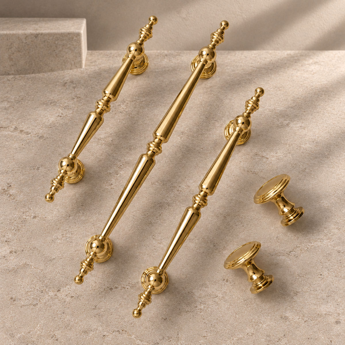 PVD Bright Gold Cabinet Pull & Knob — Solid Brass on a neutral stone studio background