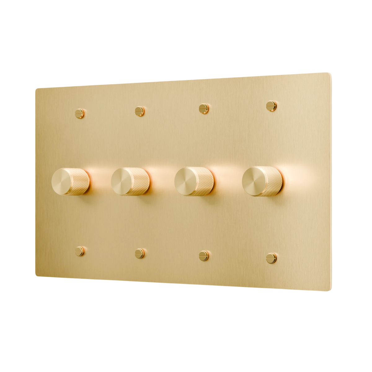 Gold wall plate with four dimmer knobs on a white background