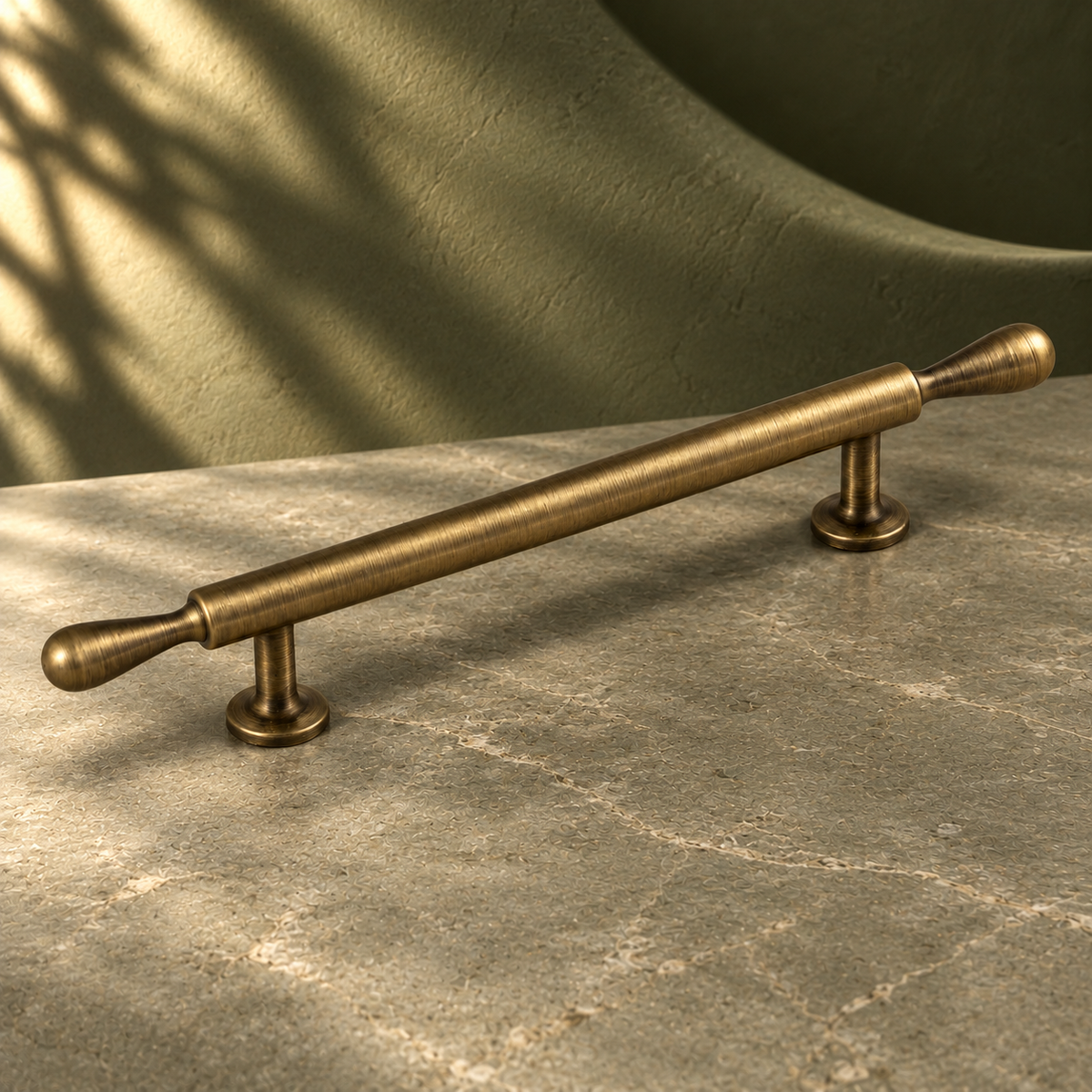 Slim Bar Cabinet Pull & Knob — Antique Brass on a deep olive studio background