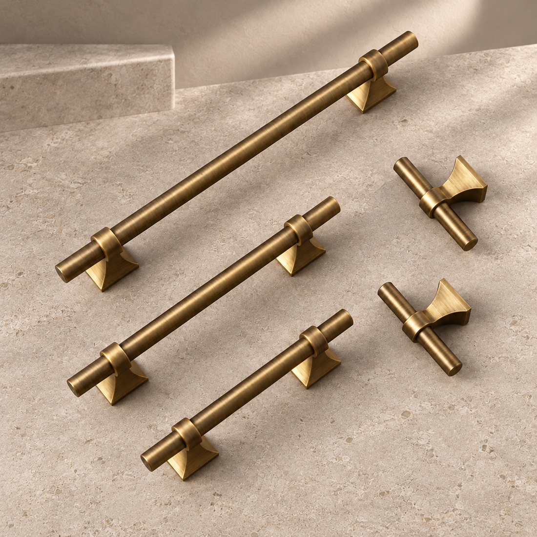 Solid Antique Brass Cabinet Pull & T Knob — Modern Design on a neutral stone studio background