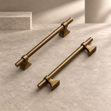 Solid Antique Brass Cabinet Pull & T-Bar Knob — Retro Design on a neutral stone studio background