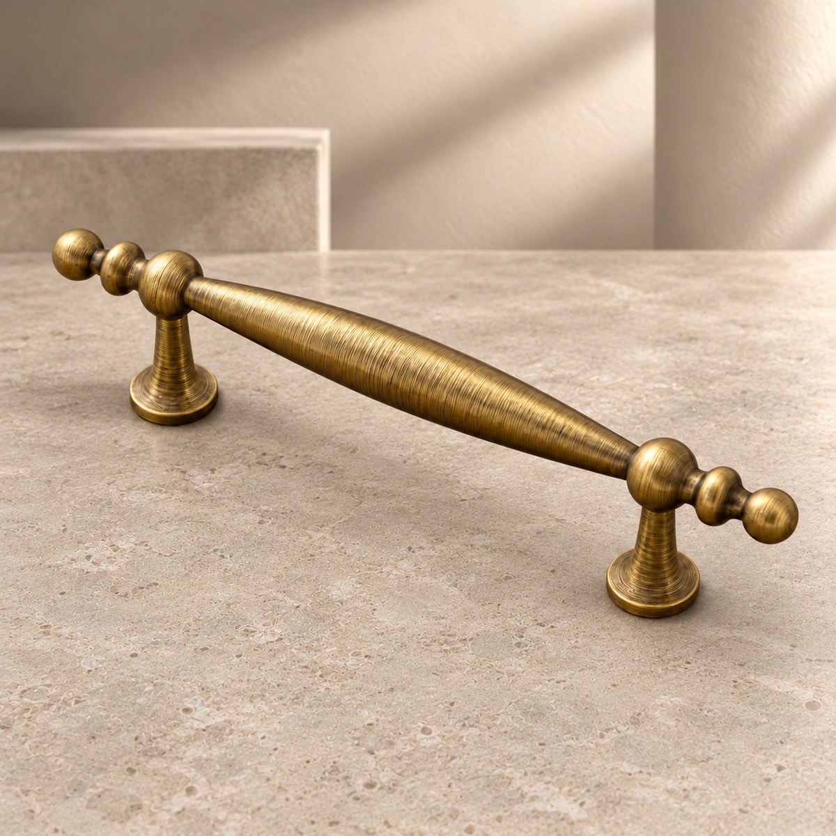 Solid Brass Arc Cabinet Pull & Knob — Antique Brass Finish on a neutral stone studio background