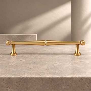 Solid Brass Cabinet Bar Pull — Brushed Brass Finish on a neutral stone studio background