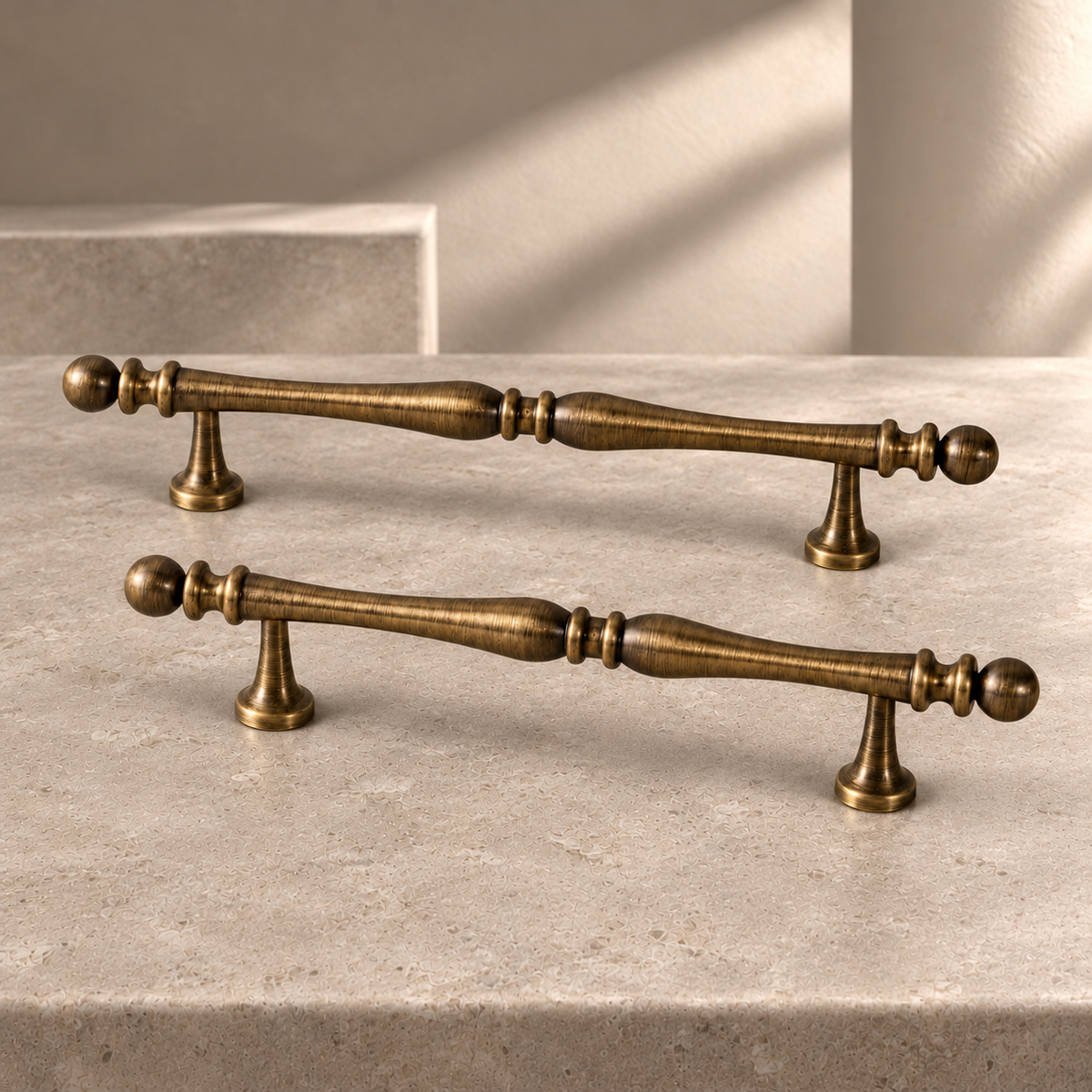 Solid Brass Cabinet Handle & Knob — Brushed Antique Brass Finish on a neutral stone studio background