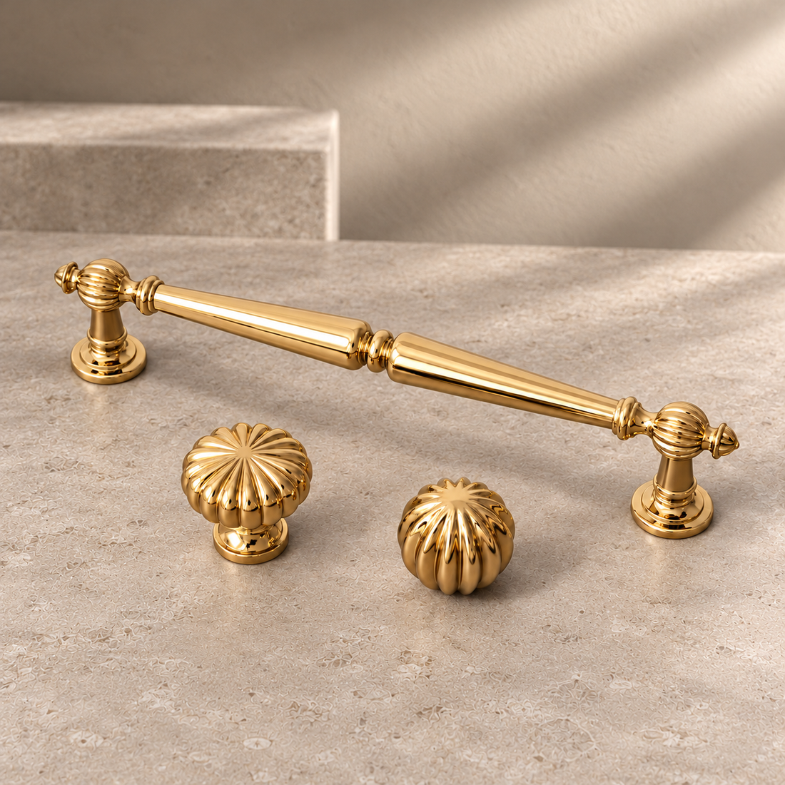 Solid Brass Cabinet Handle & Knob — Polished Brass Finish, Pumpkin Design on a neutral stone studio background