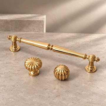 Solid Brass Cabinet Handle & Knob — Polished Brass Finish, Pumpkin Design on a neutral stone studio background
