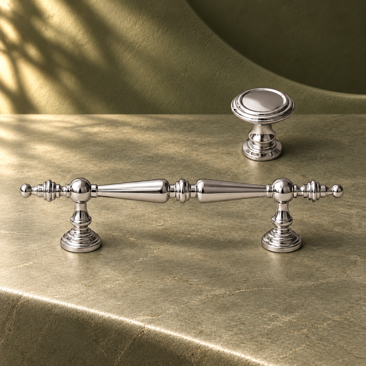 Crystal-End Cabinet Pull & Knob — Bright Chrome on a deep olive studio background
